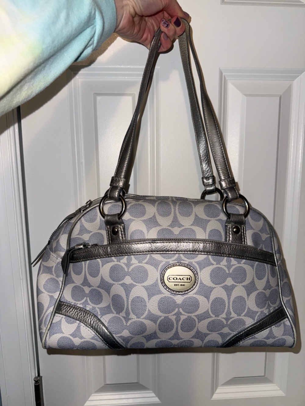 Gray/silver Coach purse